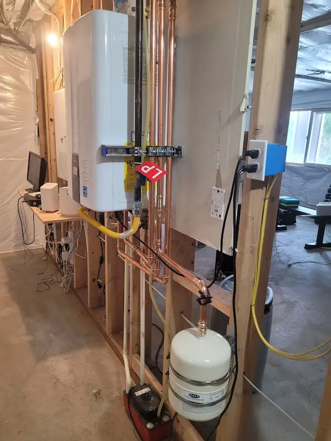 Licensed plumber repairing a kitchen sink in Dillon